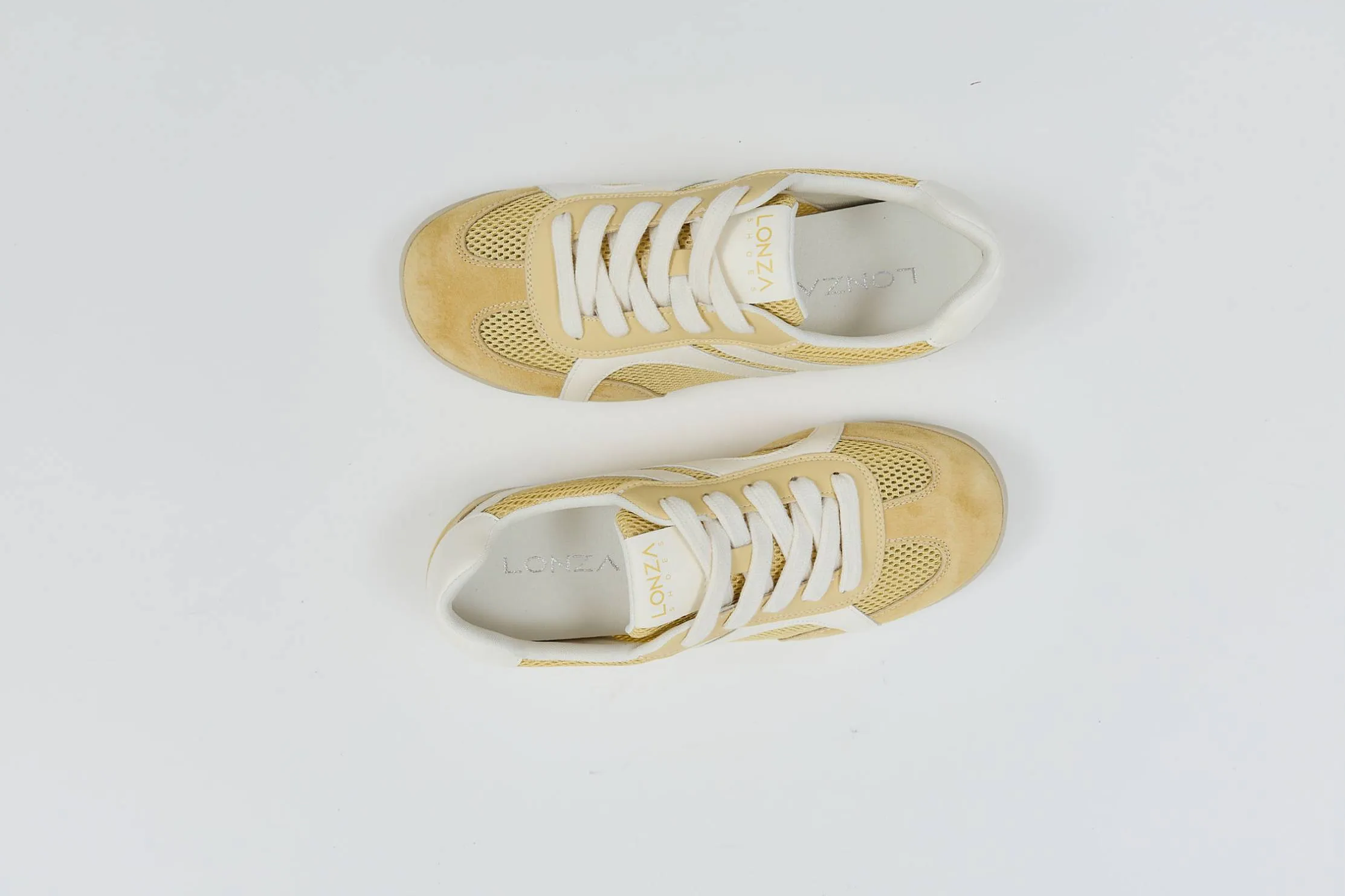 жовті кросівки